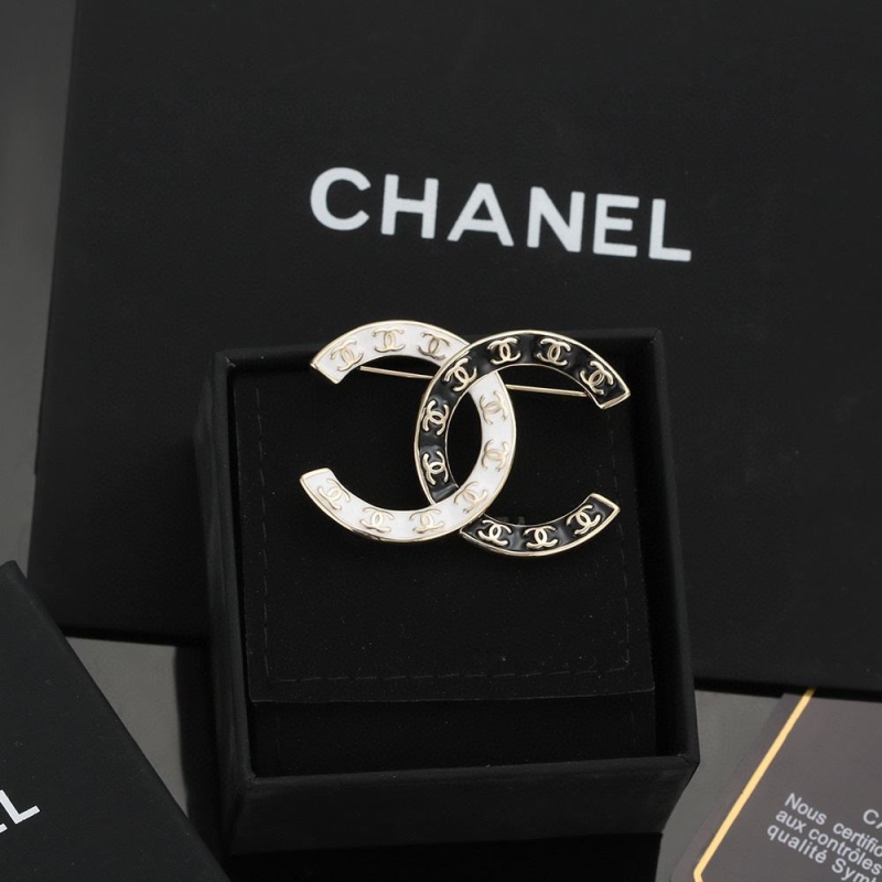Ch*el brooches